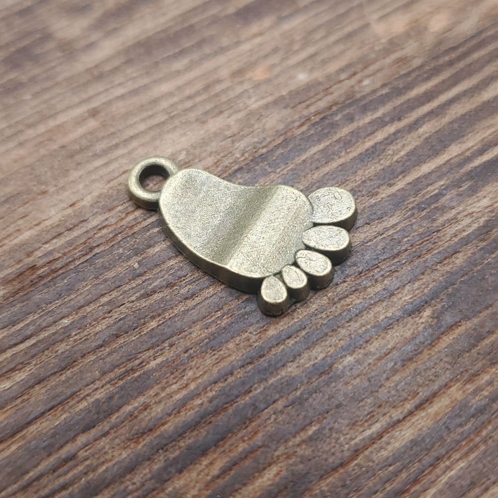 P107 baby's footprints on my‎ heart charm pendant